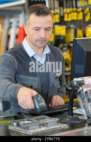 portrait of a worker using barcode reader Stock Photo