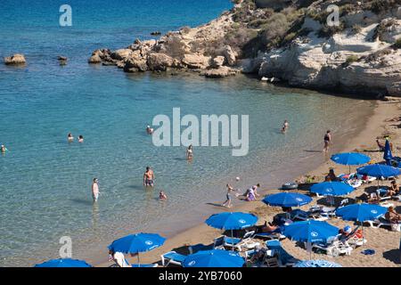 sunbathers enjoying the clear waters of Kapparis beach in Cyprus Stock Photo