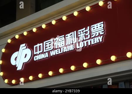 Shanghai,China-Dec. 18th 2022: close up China Welfare Lottery store brand logo Stock Photo