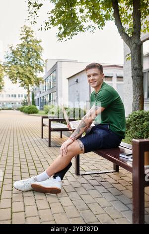 A young man with a prosthetic leg sits on a bench in a bright, welcoming outdoor environment, smiling confidently. Stock Photo