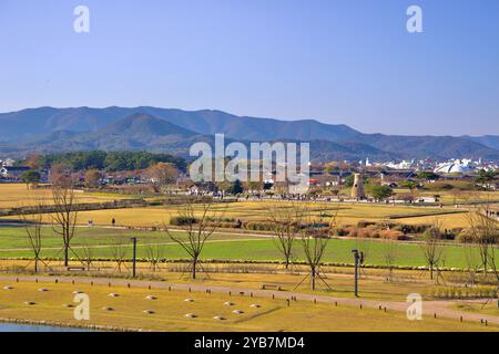 Gyeongju City, South Korea - November 11th, 2023: A panoramic view of Cheomseongdae, the world's oldest surviving astronomical observatory, with vast Stock Photo