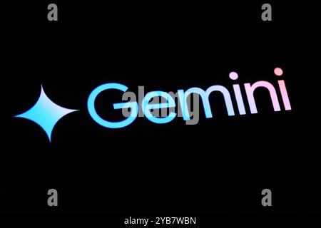 Gemini AI model logo sign on black background. Google's AI model Stock Photo