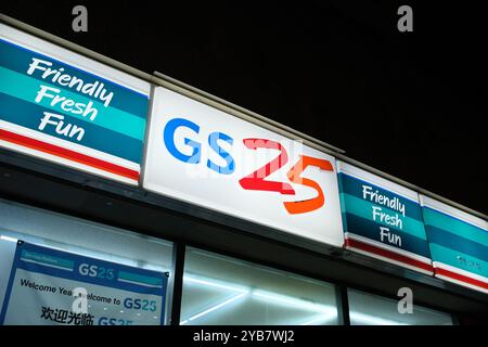 Jeju, South Korea-May 23rd 2024: GS25 store brand logo sign at night. Korean convenience store Stock Photo