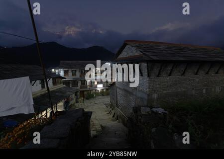 Ghandruk, Nepal November 11 2023: the gurung village in ghandruk is surround by snow mountain in the poonhill trekking route Stock Photo