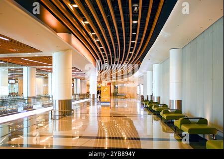 MUSCAT - SEPT 17: Interior of Muscat International Airport, arrival part in Muscat on September 17. 2024 in Oman Stock Photo