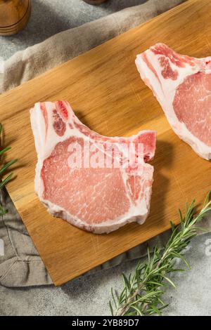Organic Raw Bone in Pork Chops Ready to Cook Stock Photo