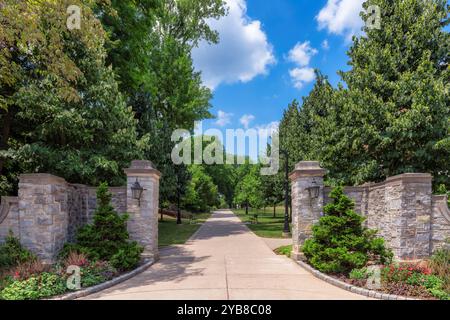Stone gate to the garden park in campus of State University Stock Photo