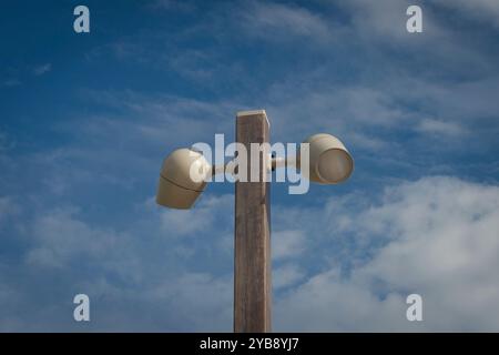 modern contemorary street lamp in a sunny day against a blue sky background Stock Photo