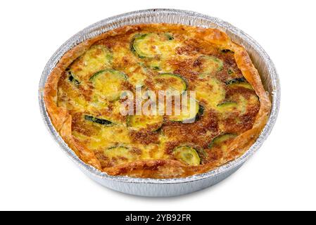 Zucchini and egg savoury pie, savory cake in aluminum foil pan freshly baked, isolated on white with clipping path included Stock Photo