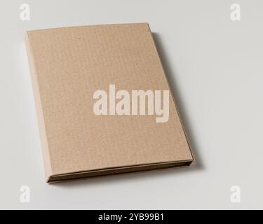 Elegant and minimal cardboard folder on white background. Mockups and templates. Stock Photo