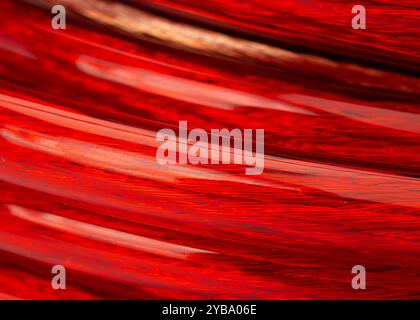 Close Up of Red Insulated Copper Wire Coil Stock Photo