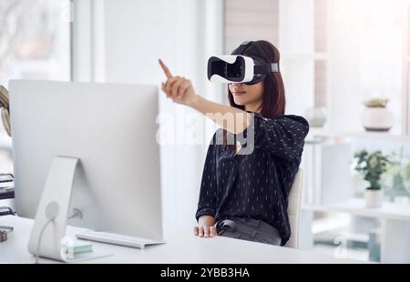 Business woman, VR or headset with futuristic technology for virtual world, interaction or software at office desk. Female person, developer or Stock Photo