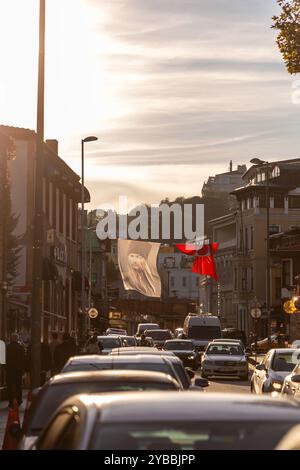 Istanbul, Turkiye - OCT 14, 2024: Large Turkish flags and Ataturk posters hanging in Ortakoy in Besiktas, Istanbul. Stock Photo