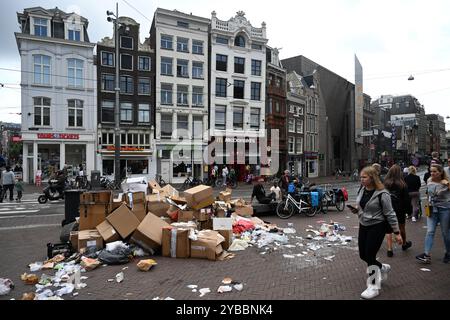 Amsterdam, Netherlands - August 26, 2024: A pile of garbage on street in the center of Amsterdam. Stock Photo