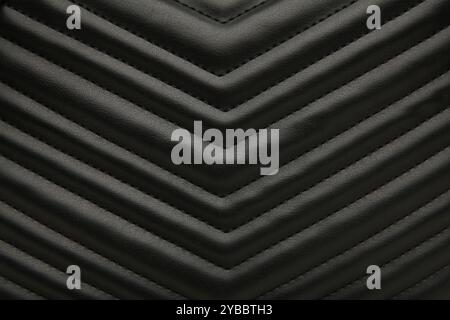 Elegant black leather texture background. Space for text. Top view Stock Photo