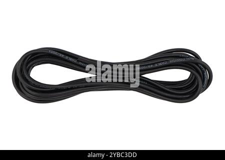 Black coaxial cable isolated on white background. Stock Photo