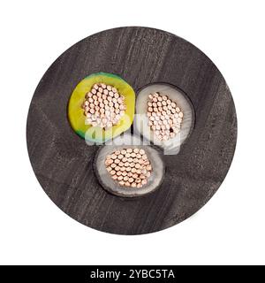 Cross-section of electrical cables with three copper wires Stock Photo