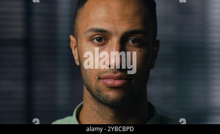 Close-up serious disappointed handsome african american man looking camera sad frustrated young pensive ethnic guy businessman entrepreneur manager Stock Photo