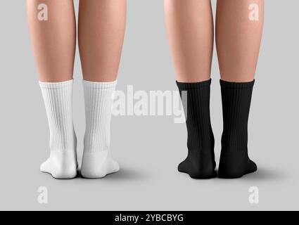 Mockup of black, white long socks with elastic band on slim female legs, back view, isolated on background with shadows. Set of high gaiters. Foot clo Stock Photo