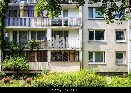 Soviet era architecture style of living district in Vilnius, Lithuania. Post-soviet urban architecture. Wall with windows and balconies. Stock Photo