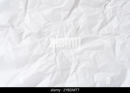 Top view and full frame of wrinkled or crumpled white stencil paper texture is used for wrinkled or crumpled white paper background texture Stock Photo