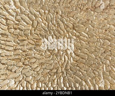 24K gold background texture made of gold leaf with abstract petals pattern Stock Photo