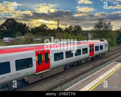 Pontyclun, Wales - 1 October 2024: Transport for Wales Class 197 diesel commuter train stopped at the village station of Pontyclun Stock Photo