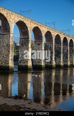 The Royal Border Bridge which carries the main east coast line across the River Tweed viewed from the south side of the river Stock Photo