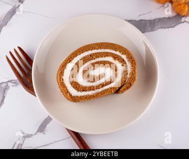 Pumpkin Swiss Roll being served Stock Photo
