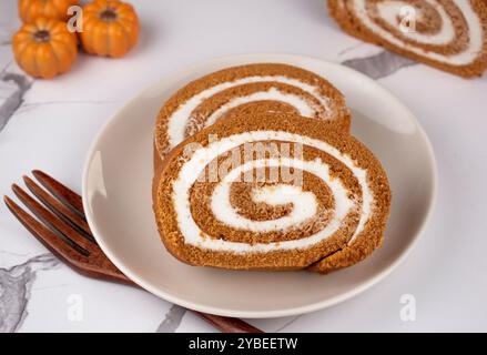 Pumpkin Swiss Roll being served Stock Photo