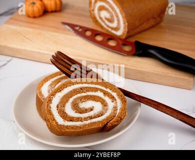 Pumpkin Swiss Roll being served Stock Photo