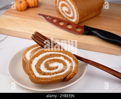 Pumpkin Swiss Roll being served Stock Photo
