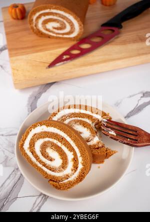 Pumpkin Swiss Roll being served Stock Photo