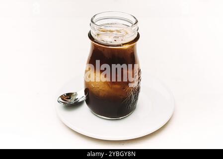 Glass of iced coffee isolated on white background Stock Photo