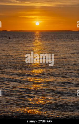 A streak of sunlight going across the Severn Stock Photo