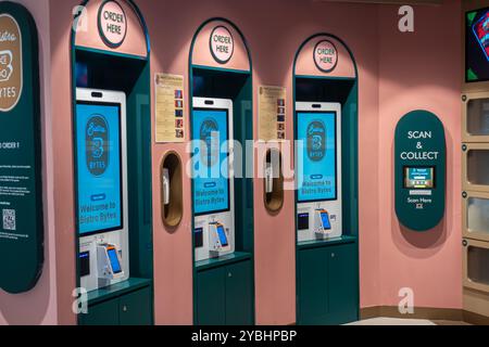 Bistro Bytes ready-to-eat food court store with boxes where a shopper picks the food order up - scan and collect technology. Singapore Stock Photo