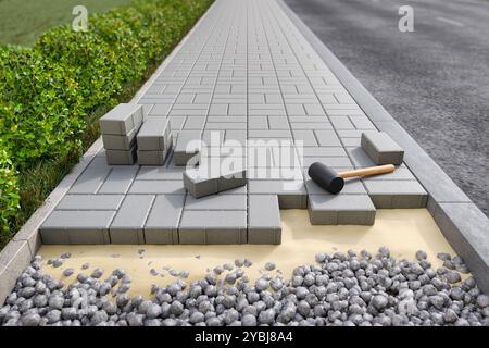 Rectangular concrete bricks on sidewalk pavement - 3d rendering Stock Photo