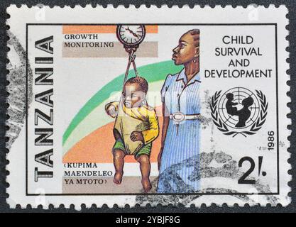 Child survival and development on postage stamp from Tanzania Stock ...