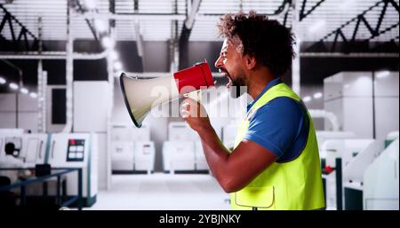 African Speaker Announce News In Megaphone. Excited Man Shouting Stock Photo