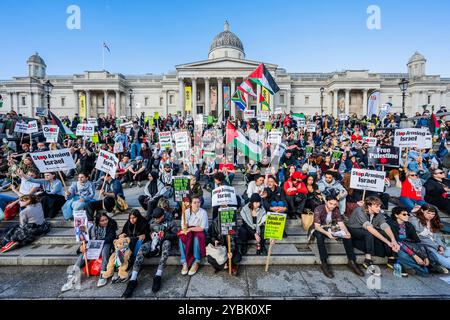 London, UK. 19th Oct, 2024. London protest for Palestine in Trafalgar Square. Protesters demand that Britain ends its 'complicity in Israel's genocide in Palestine, and its bombing and ground invasion of Lebanon'. The protest was organised by Stop the war, the Palestine Solidarity Campaign UK and Friends of Al Aqsa and others. Credit: Guy Bell/Alamy Live News Stock Photo