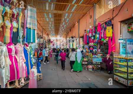 Marrakesh, Morocco - February 18 2024: View of the souk in Jemaa el-Fnaa, the famous square at the medina quartet. Stock Photo