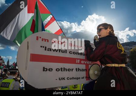 London, UK, October 19th. Elaaheh Jamali, aka LilyMoo, an Iranian leads a counter protest against the Pro Palestine, Hamas and Hezbollah rally in Trafalgar Square London.  (Tennessee Jones - Alamy Live News) Stock Photo