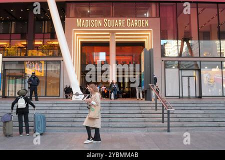 People Walk Past Madison Square Garden In Manhattan New York City people-walk-past-madison-square-garden-in-manhattan-new-york-city