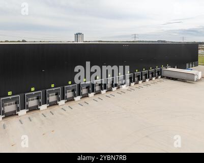 lots of empty loading docks of a large warehouse Stock Photo