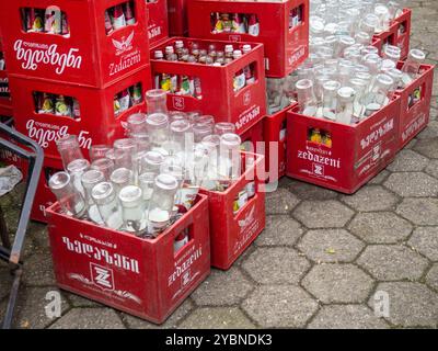 Batumi, Georgia. 06.18.2024  Lots of empty glass bottles in boxes. Empty lemonade container. Lemonade Zidazeni. Used bottles Stock Photo