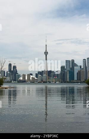 Toronto, ON, Canada - June 13th 2024: View across Lake Ontario from the Toronto Islands of the Toronto skyline including the CN Tower in the centre. Stock Photo