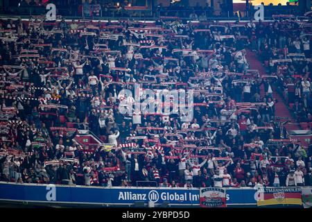 Muenchen, Deutschland. 19th Oct, 2024. Die Stuttgarter Fans im Gaesteblock. GER, FC Bayern Muenchen gegen VfB Stuttgart, Fussball, Bundesliga, 7. Spieltag, Spielzeit 2024/2025, 19.10.2024. (DFL DFB REGULATIONS PROHIBIT ANY USE OF PHOTOGRAPHS as IMAGE SEQUENCES and or QUASI-VIDEO). Foto: Eibner-Pressefoto/Heike Feiner Credit: dpa/Alamy Live News Stock Photo