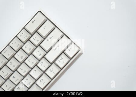 Top view of white mechanical keyboard, white keyboard with various layouts isolated on a white background. Stock Photo