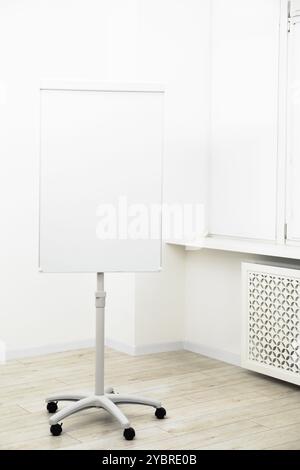 Flip chart in office. Mockup for design Stock Photo - Alamy