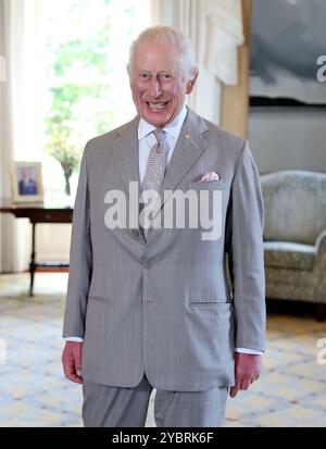 King Charles III smiles for photographers at Admiralty House in Sydney, the official residence of the governor-general, on day one of the royal visit to Australia and Samoa. Picture date: Sunday October 20, 2024. Stock Photo